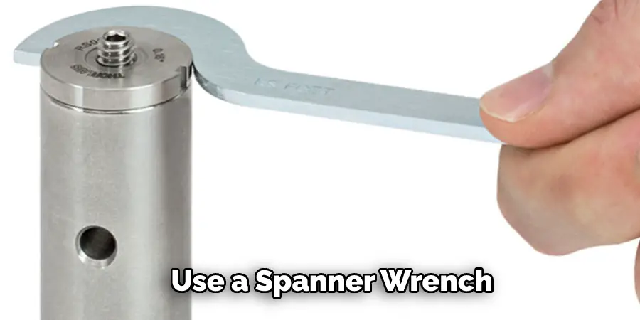 Use a Spanner Wrench