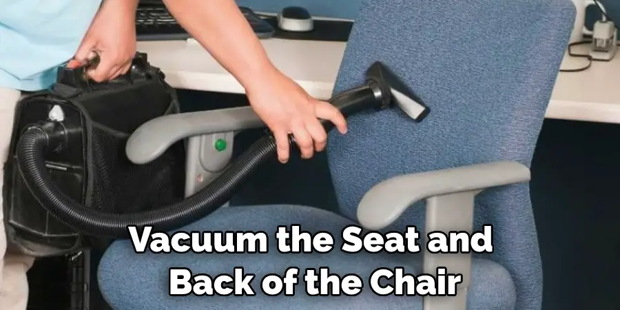 Vacuum the Seat and  Back of the Chair