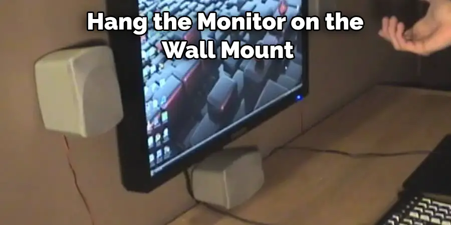 Hang the Monitor on the  Wall Mount
