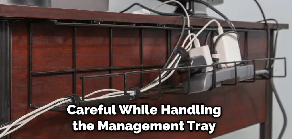 Careful While Handling the Management Tray
