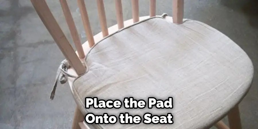 Place the Pad Onto the Seat