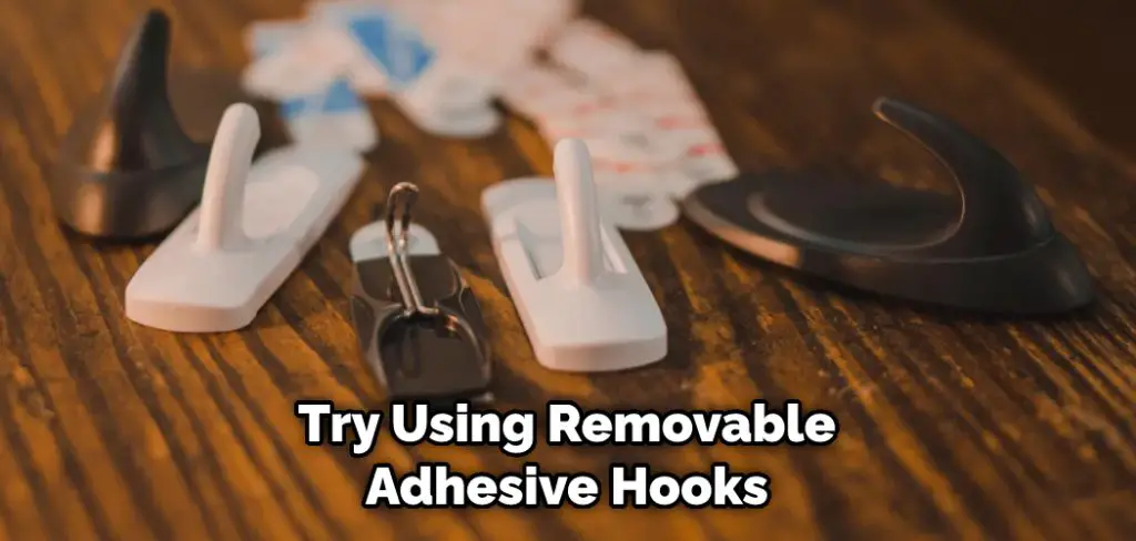 Try Using Removable Adhesive Hooks