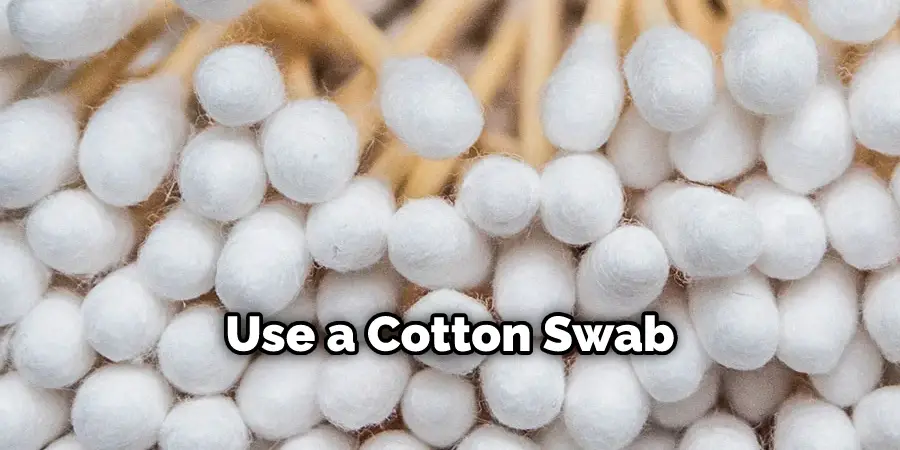 Use a Cotton Swab