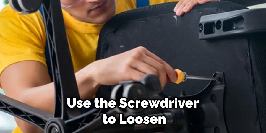 Use the Screwdriver to Loosen