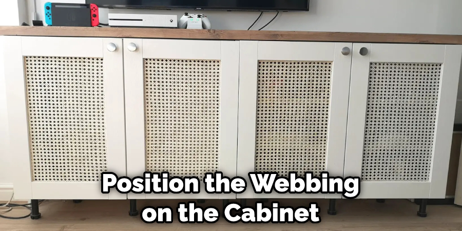 Position the Webbing on the Cabinet
