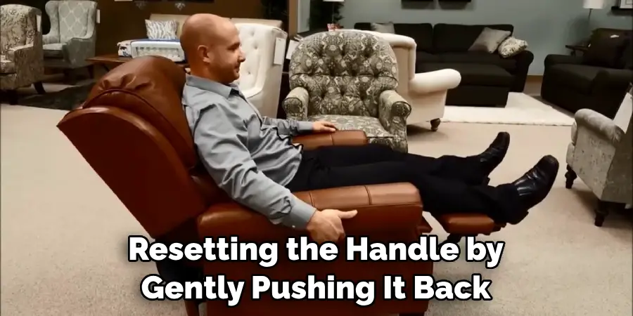 How To Fix A Recliner Footrest 11 Effective Guides 2024   Resetting The Handle By Gently Pushing It Back 