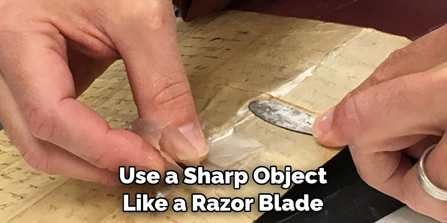 Use a Sharp Object Like a Razor Blade