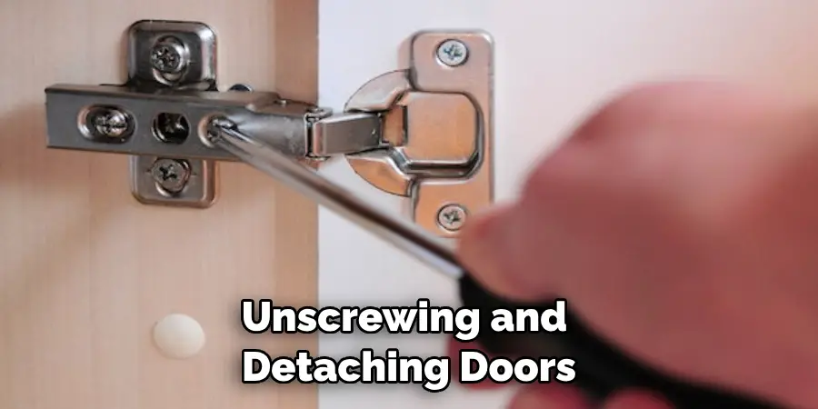 Unscrewing and Detaching Doors