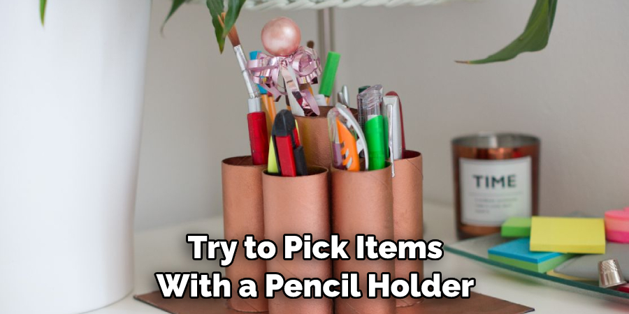 Try to Pick Items With a Pencil Holder