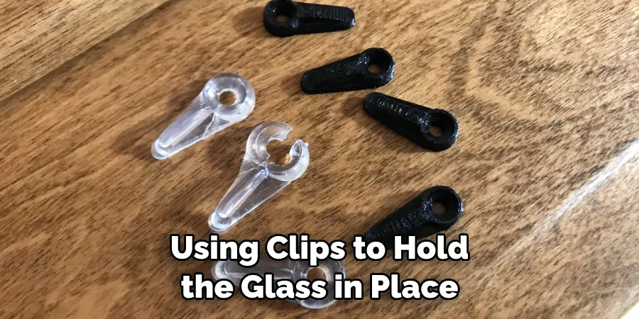Using Clips to Hold the Glass in Place