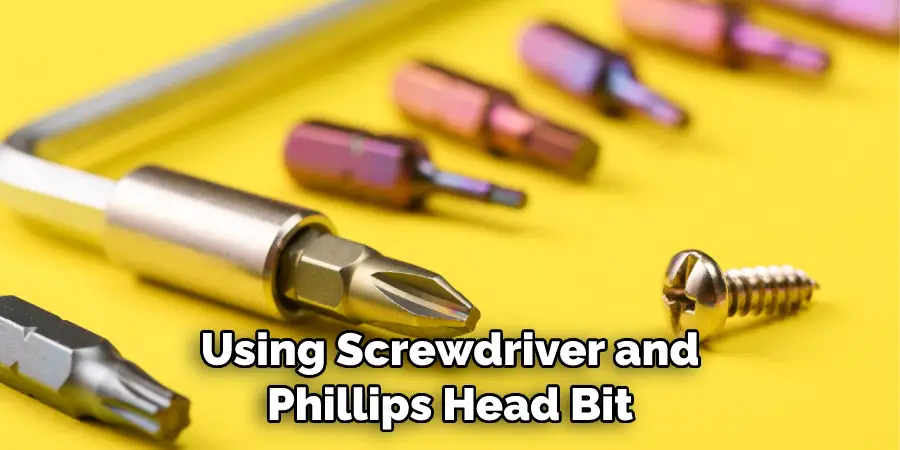 Using Screwdriver and Phillips Head Bit