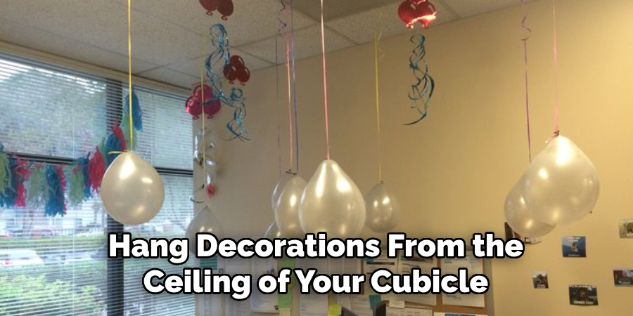 Hang Decorations From the Ceiling of Your Cubicle