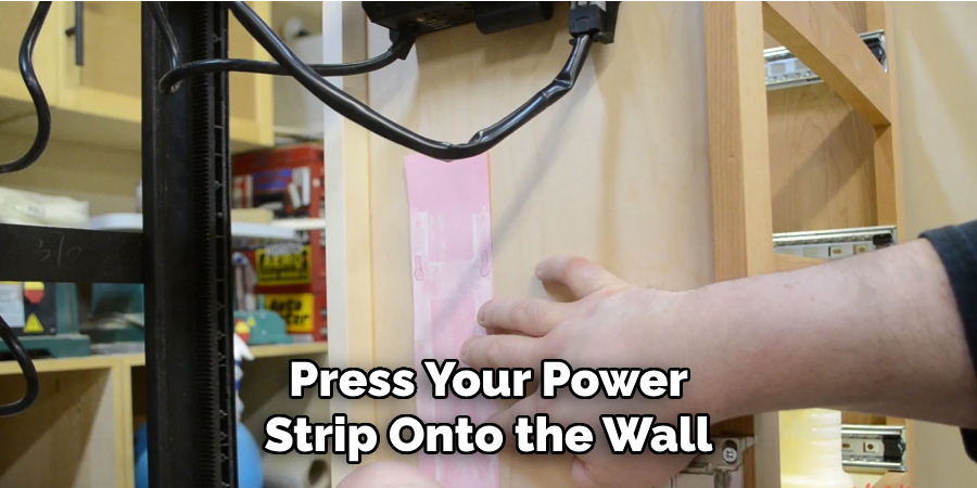 Press Your Power Strip Onto the Wall