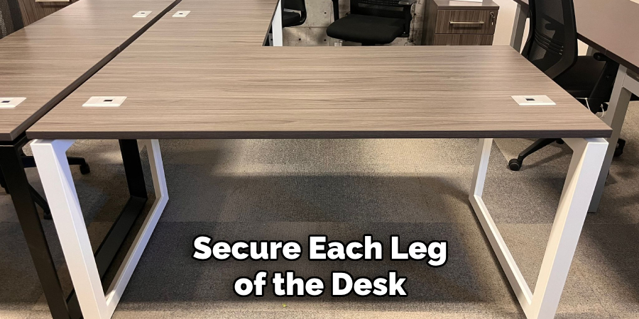 Secure Each Leg of the Desk