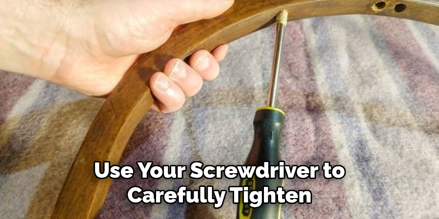 Use Your Screwdriver to Carefully Tighten