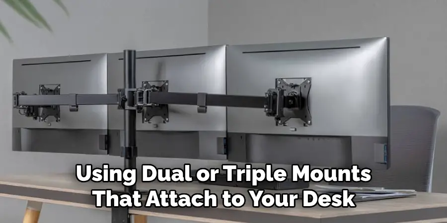 Using Dual or Triple Mounts That Attach to Your Desk