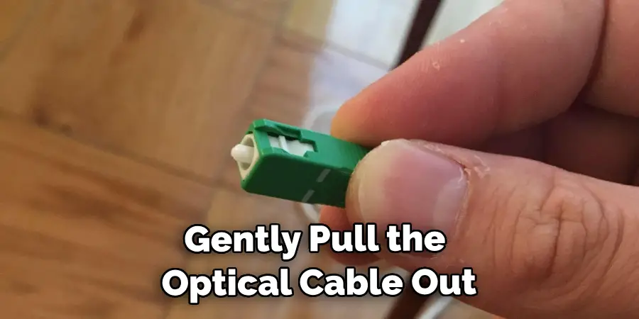 Gently Pull the Optical Cable Out