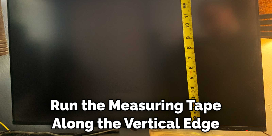 Run the Measuring Tape Along the Vertical Edge