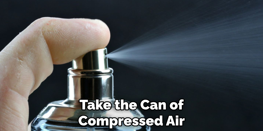 Take the Can of Compressed Air