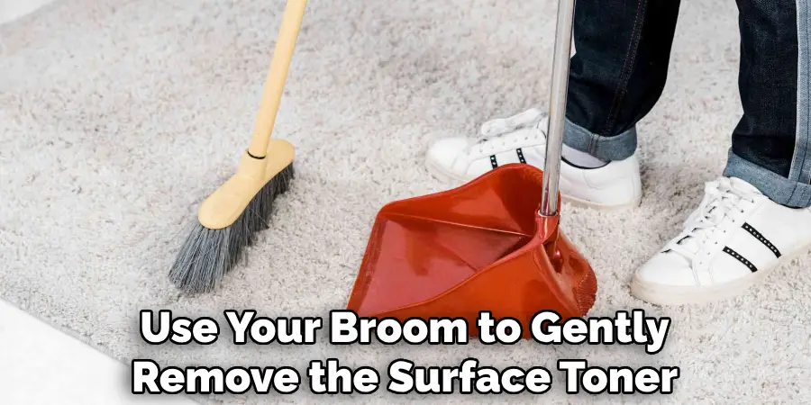 Use Your Broom to Gently Remove the Surface Toner