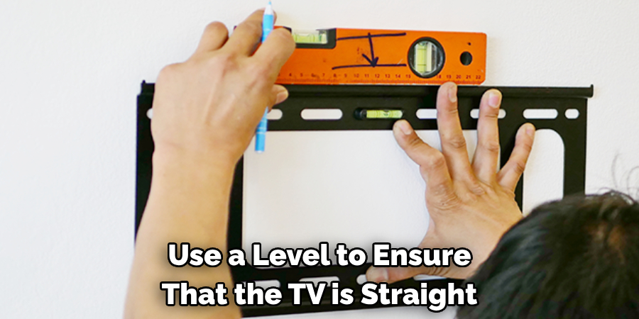 Use a Level to Ensure That the Tv is Straight