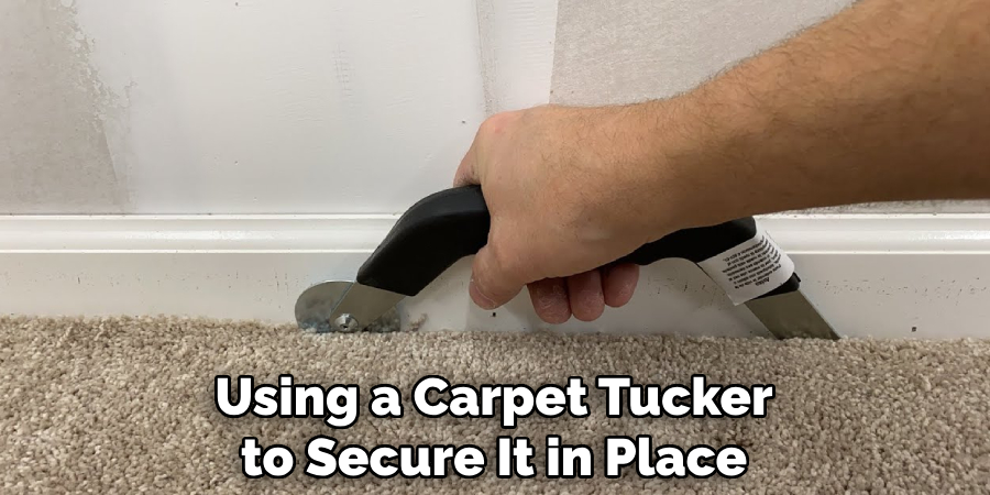Using a Carpet Tucker to Secure It in Place