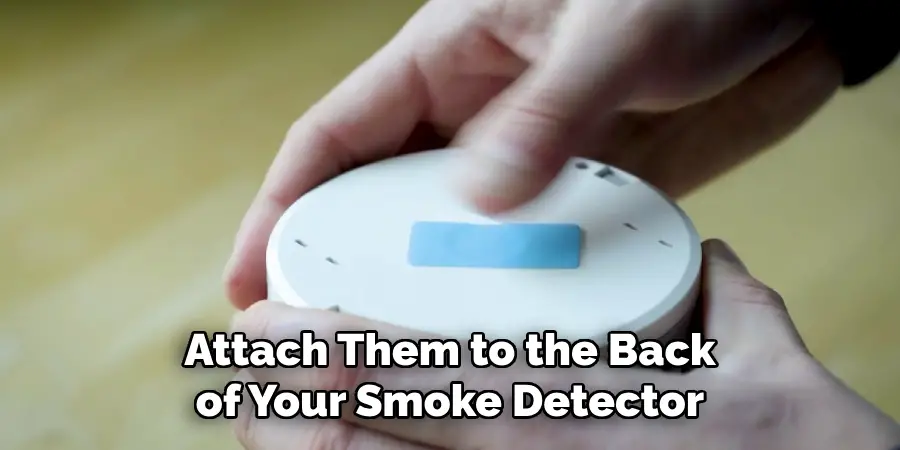 Attach Them to the Back of Your Smoke Detector