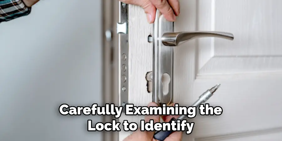 Carefully Examining the Lock to Identify