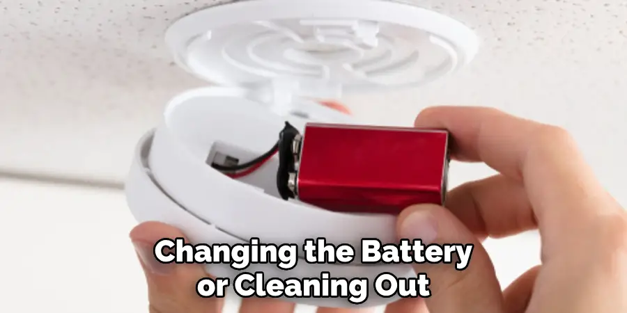 Changing the Battery or Cleaning Out