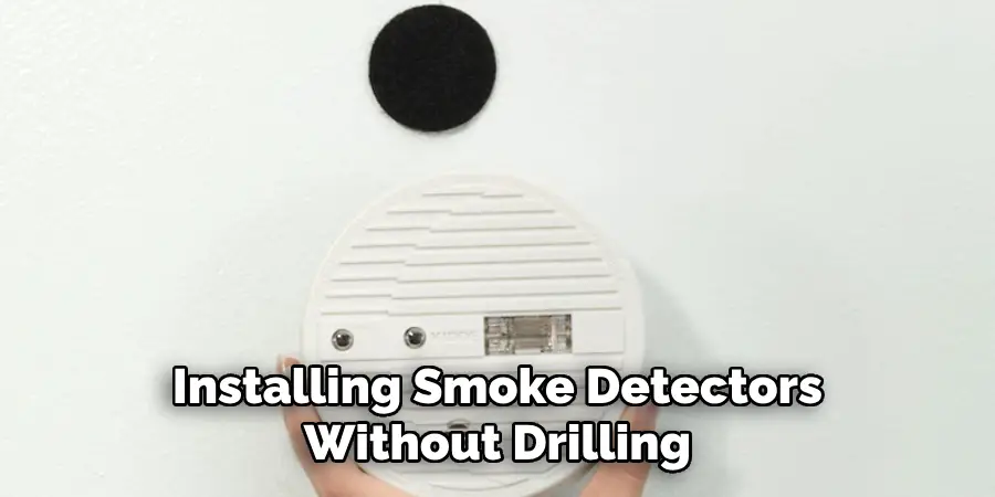 Installing Smoke Detectors Without Drilling