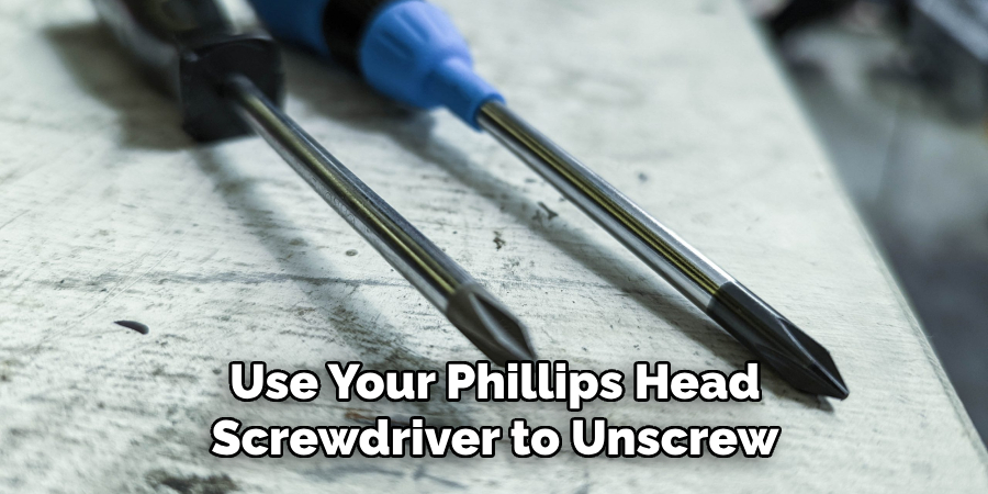 Use Your Phillips Head Screwdriver to Unscrew