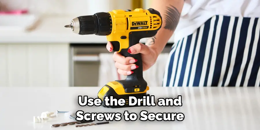 Use the Drill and Screws to Secure