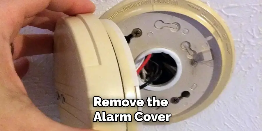 Remove the Alarm Cover