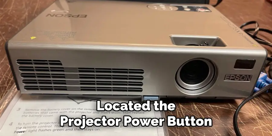 Located the
Projector Power Button