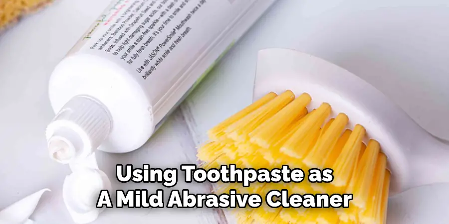 using toothpaste as a mild abrasive cleane