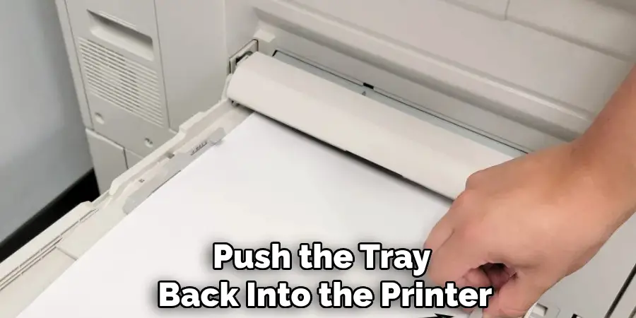 Push the Tray 
Back Into the Printer