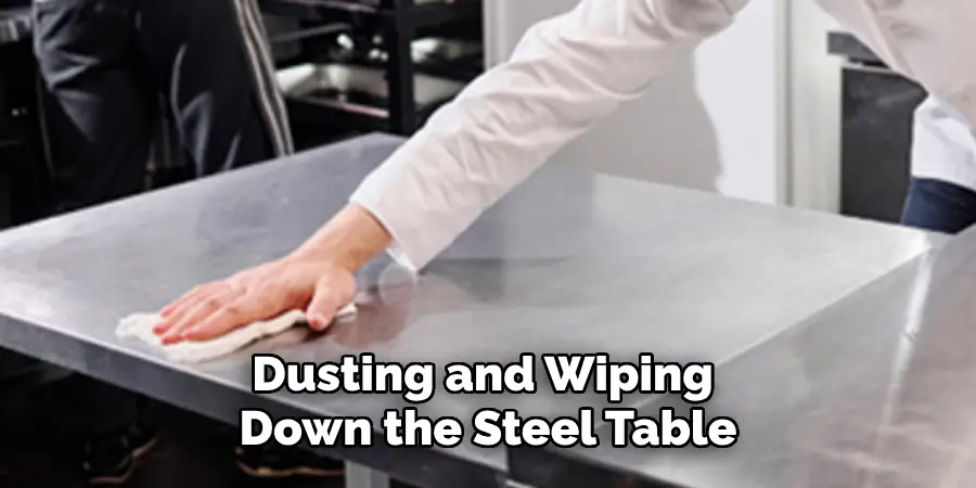 Dusting and Wiping Down the Steel Table
