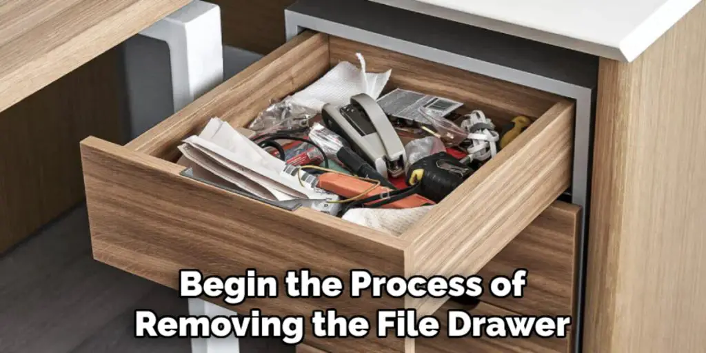 Begin the Process of
Removing the File Drawer
