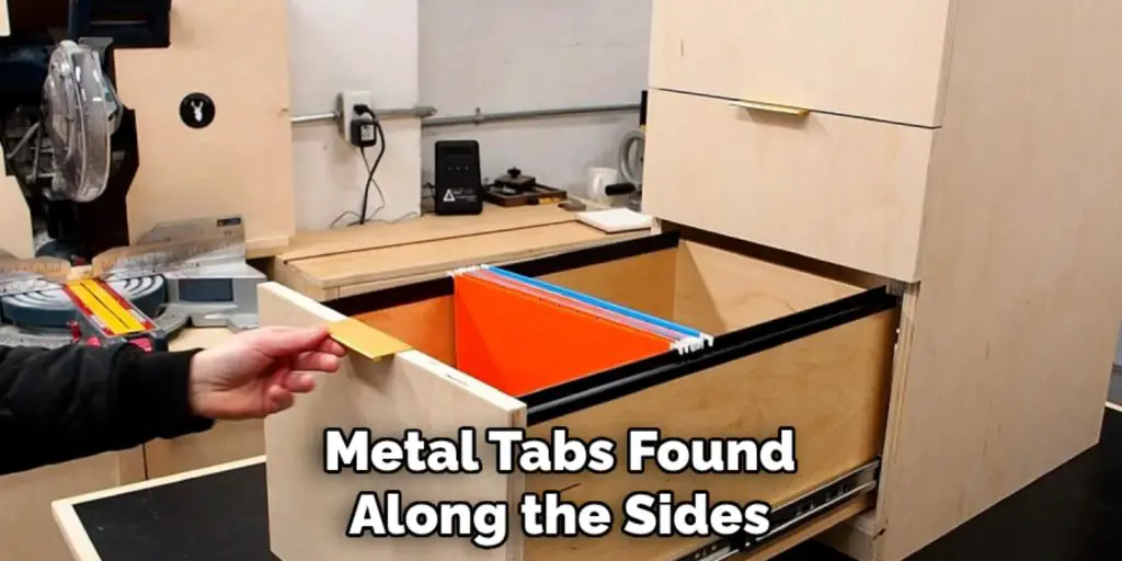 Metal Tabs Found
Along the Sides