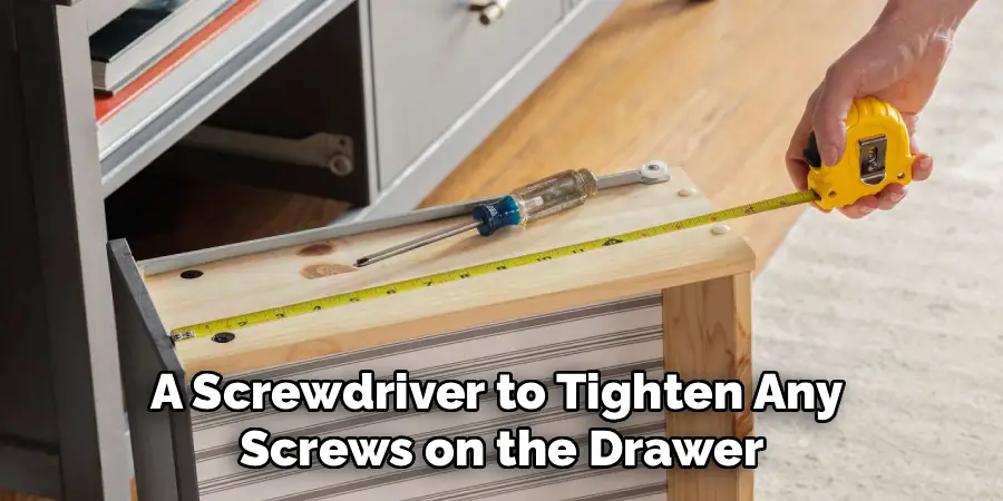 A Screwdriver to Tighten Any 
Screws on the Drawer