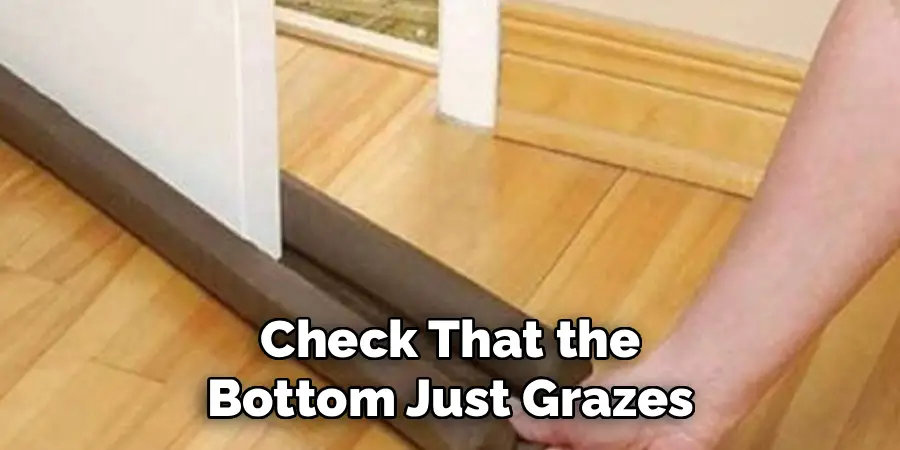 Check That the 
Bottom Just Grazes 