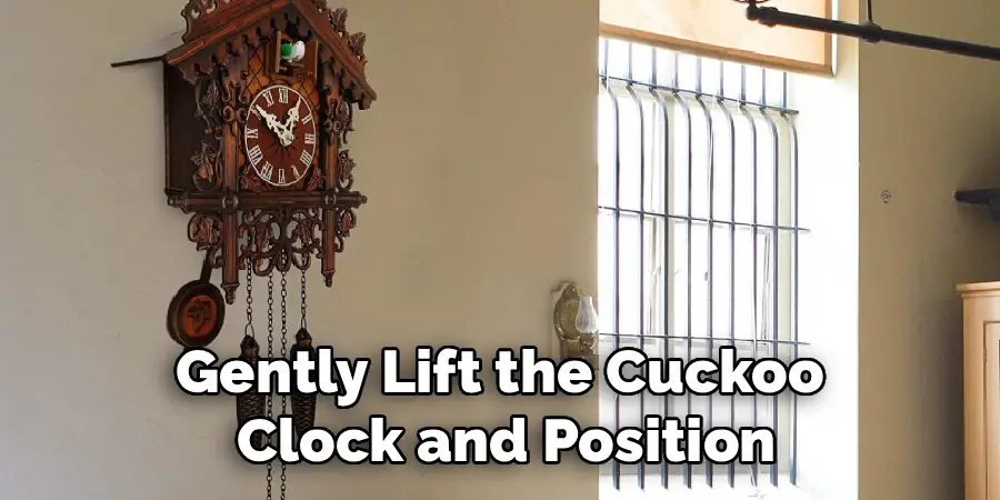 Gently Lift the Cuckoo 
Clock and Position
