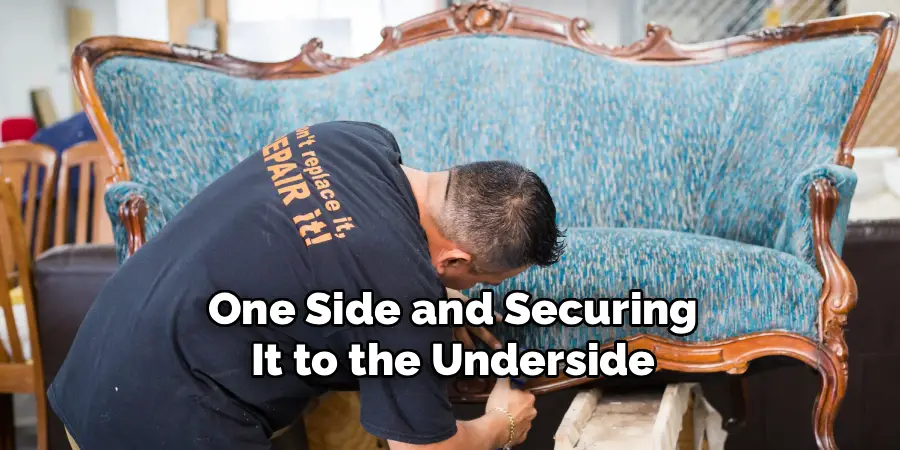One Side and Securing
 It to the Underside 