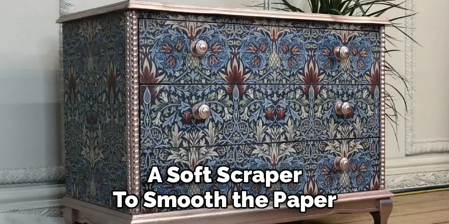 A Soft Scraper
To Smooth the Paper