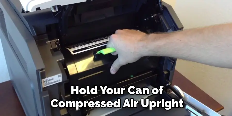 Hold Your Can of Compressed Air Upright