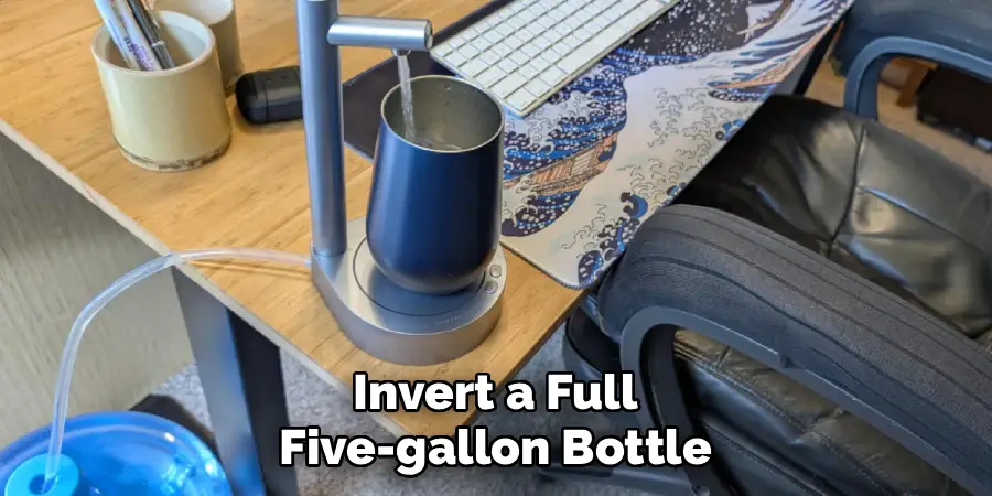 Invert a Full
Five-gallon Bottle