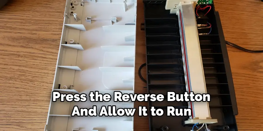 Press the Reverse Button
And Allow It to Run